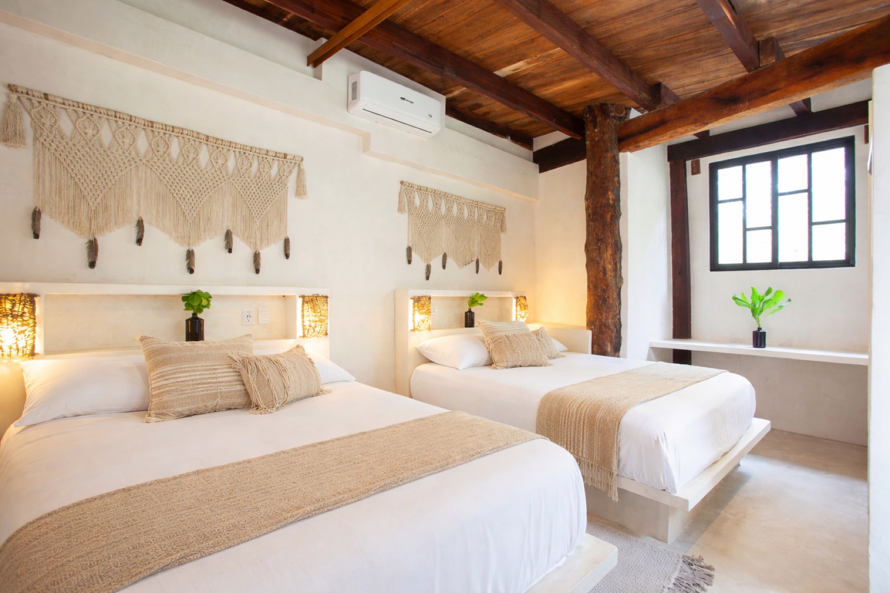 Casa Shanti double bedroom with macramé décor – Amansala Tulum