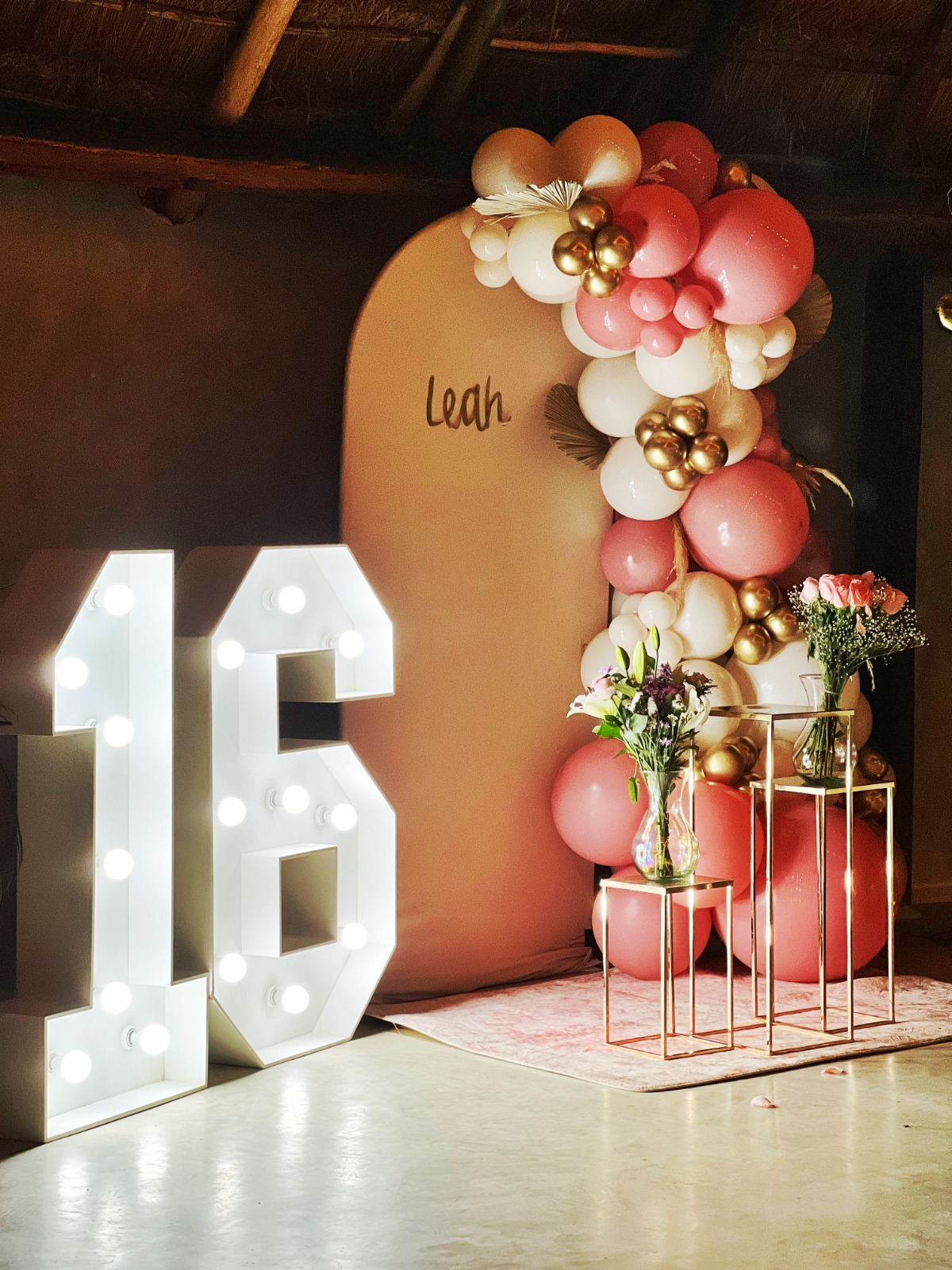 Light-up 16 marquee numbers and balloon garland with personalized name backdrop