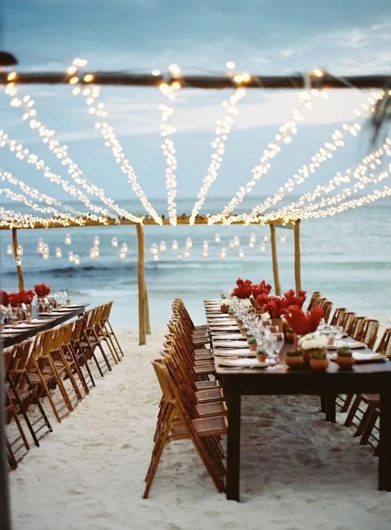 Beachfront location for a destination wedding in Tulum, lit at night