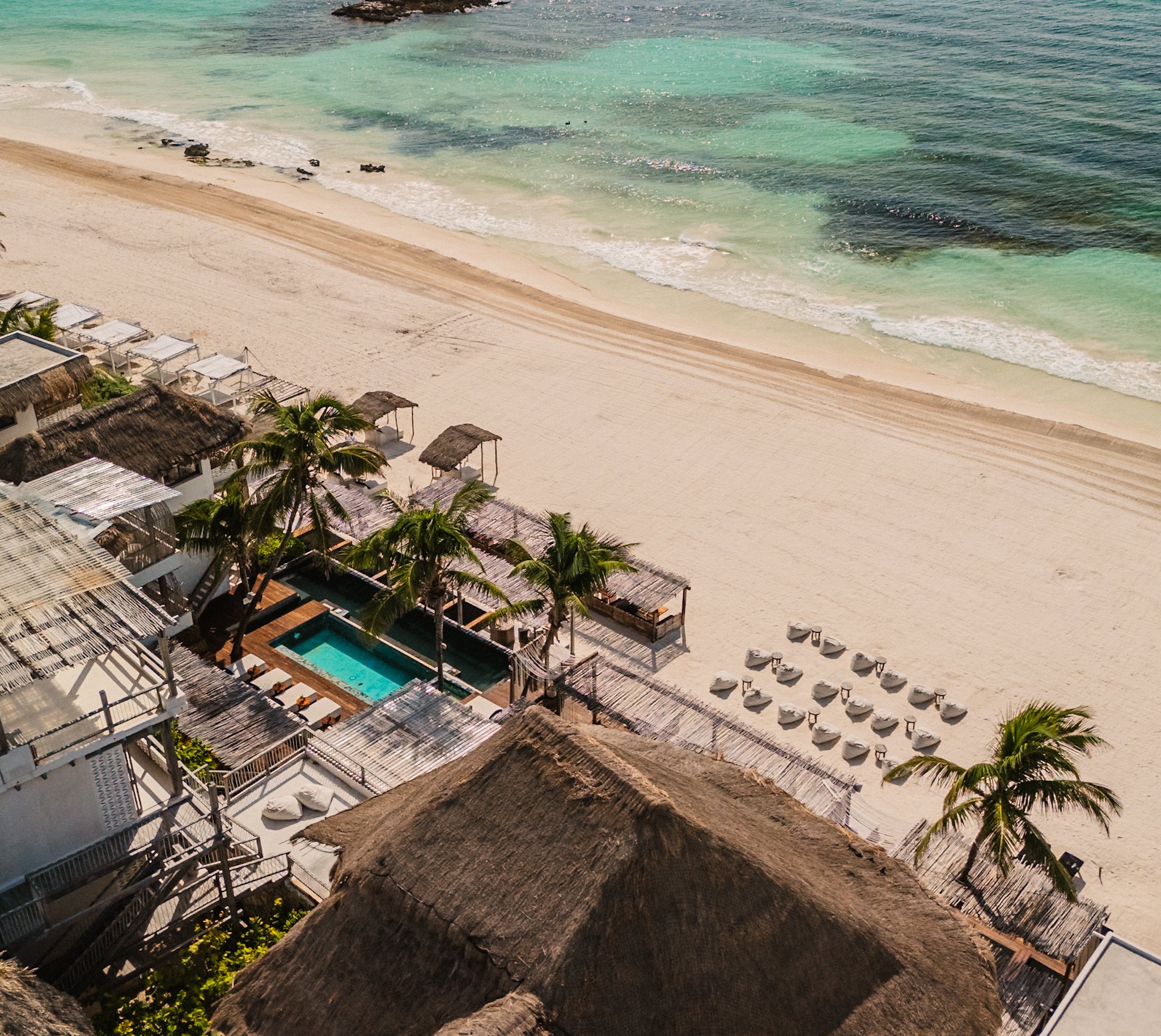 Aerial view of Amansala Eco Chic Resort on the beach in Tulum, Mexico
