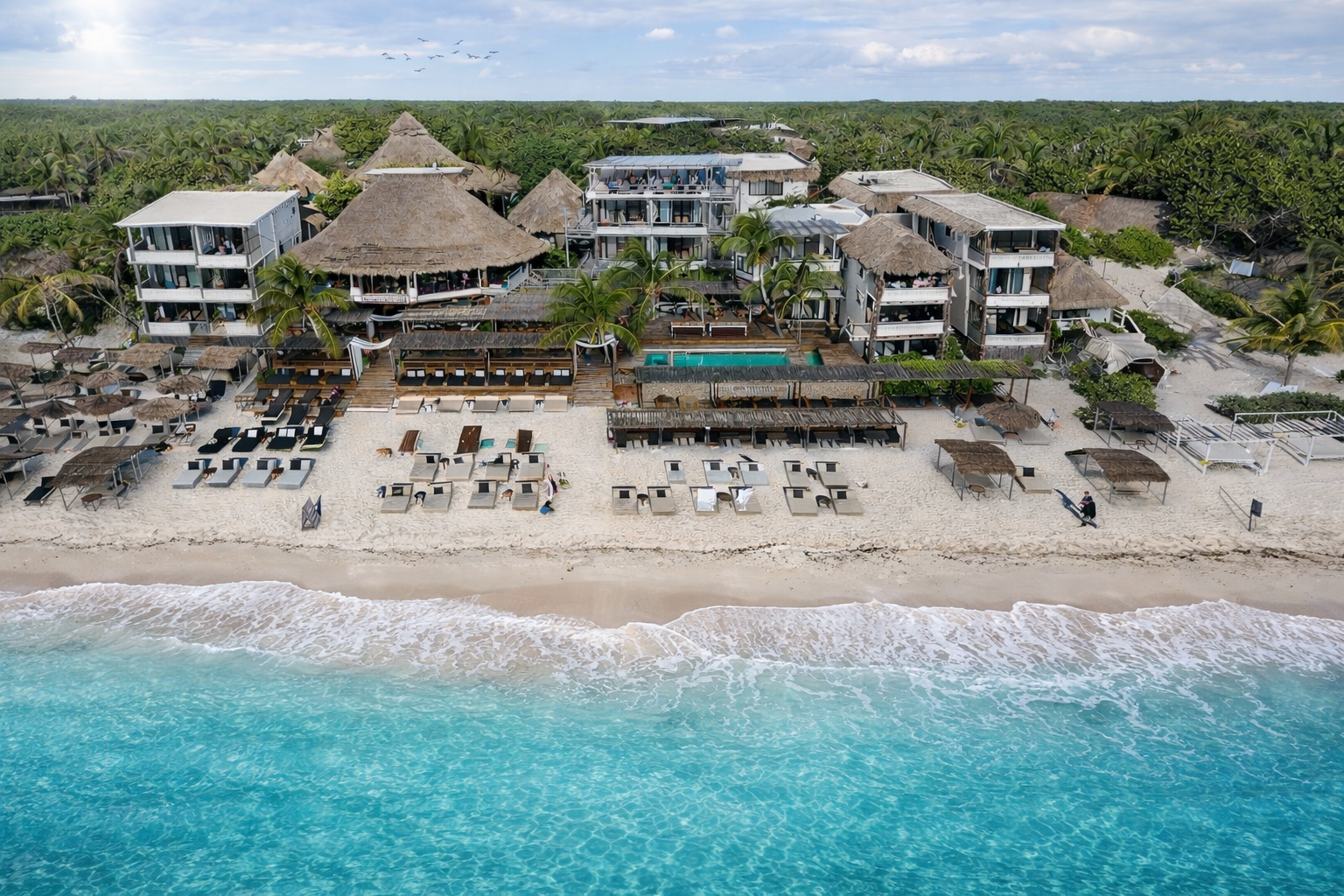 Amansala Tulum wellness retreat beach workouts and community