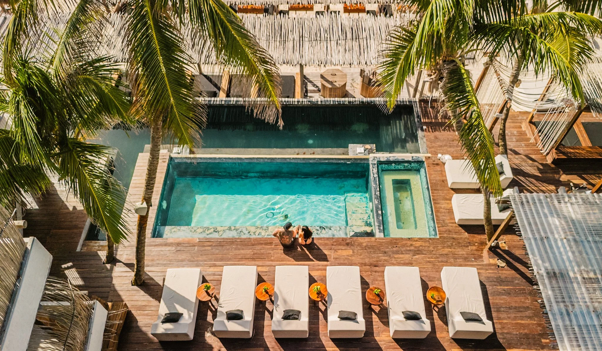 Aerial view of Amansala beachfront resort Tulum Mexico at sunset