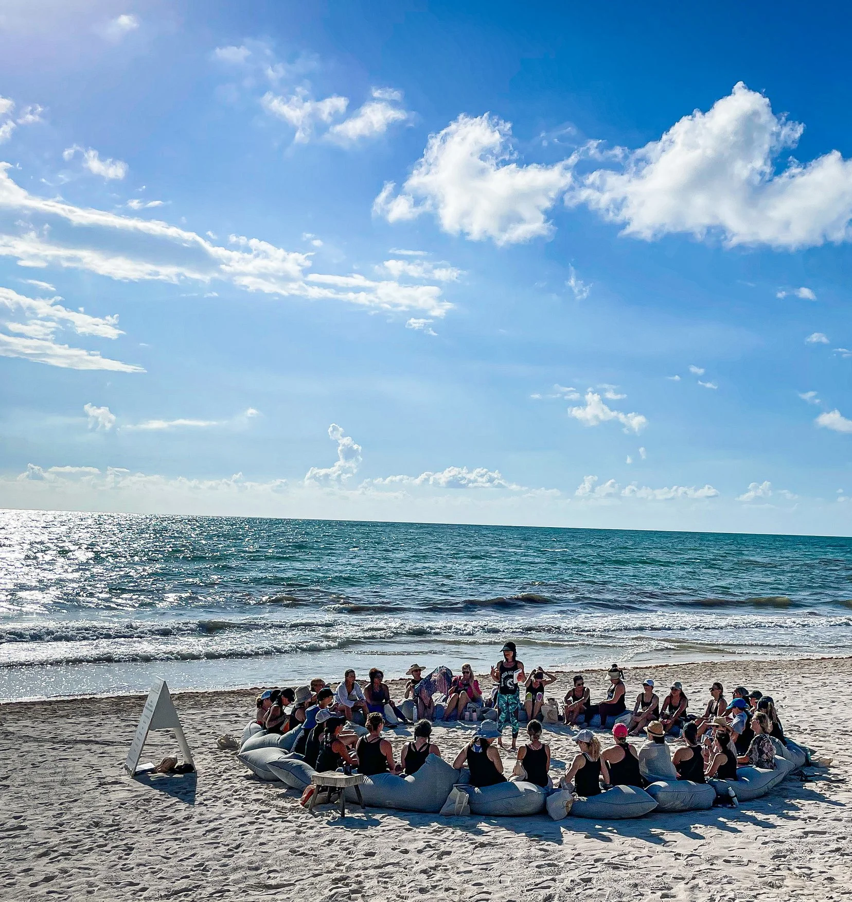 Team gathered for a leadership forum and corporate retreat in Tulum, Mexico at Amansala