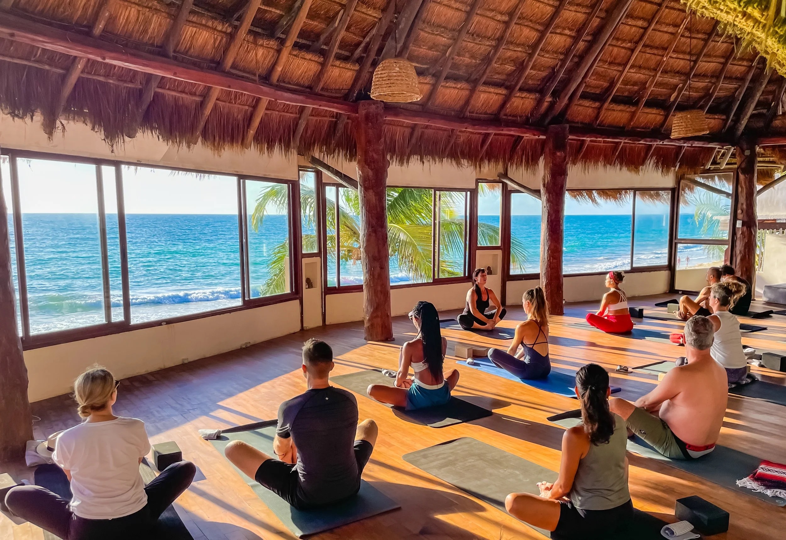 Yoga practice on the beach, Tulum, Mexico