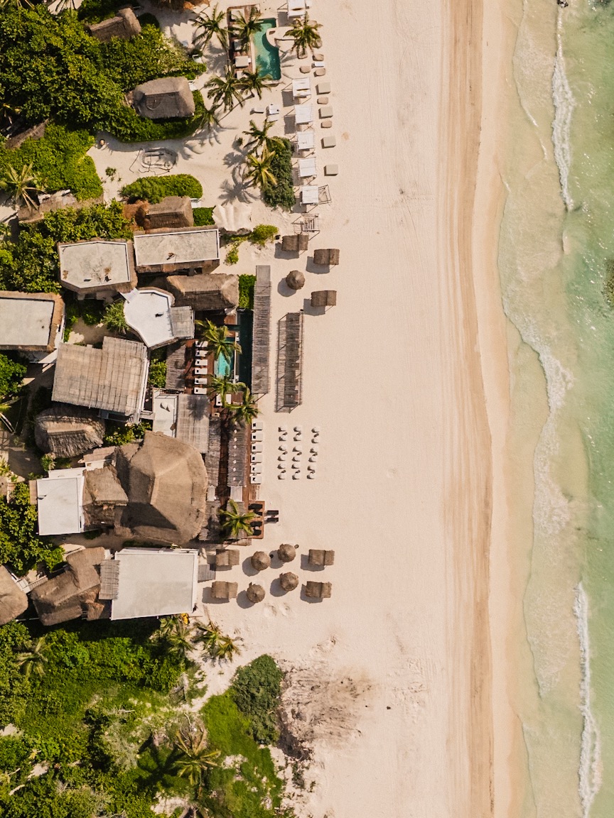 Aerial drone view of Amansala resort and beach
